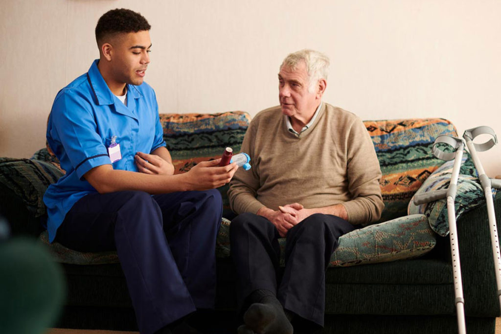 male nurse on couch with patient